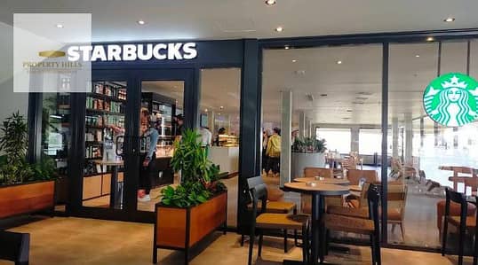 Ground floor shop for sale, immediate occupancy, with a fixed monthly rent of 147,600, located on North 90th Street in New Cairo, next to Al Marasem Hospital, near Mohamed Naguib Axis and the Suez Road. Ground floor shop for sale, immediate occupancy, with a fixed monthly rent of 147,600, located on North 90th Street in New Cairo, next to Al Marasem Hospital, near Mohamed Naguib Axis and the Suez Road.