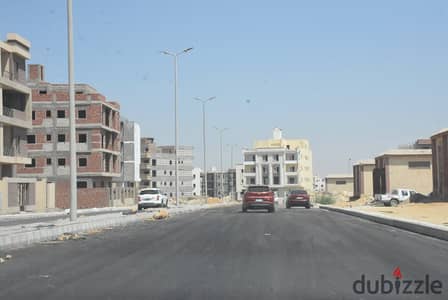 ارض للبيع بحرى - شايفه حديقه - بالحى السادس بيت الوطن - التجمع الخامس