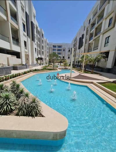 Finished apartment with ACs and kitchen at El Shorouk entrance, opposite Madinaty Gate 4 and Open Air Mall, in a 70-acre fully serviced compound.