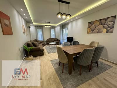 Furnished apartment for rent in Madinaty, featuring high-end (super-deluxe) finishes and hotel-style furnishings. The unit is 124 sqm, plus a 60 sqm g