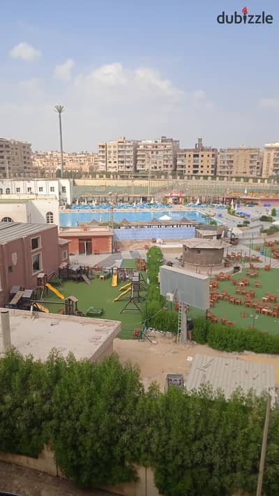 Red Brick Facade Apartment overlooking Ahram Gardens 185 meters