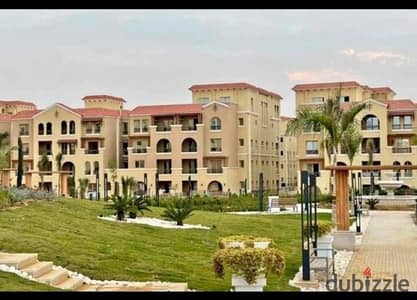Apartment for sale in Maadi Compound, ready for immediate handover, with stunning Shorouk City and garden views, plus excellent facilities and service