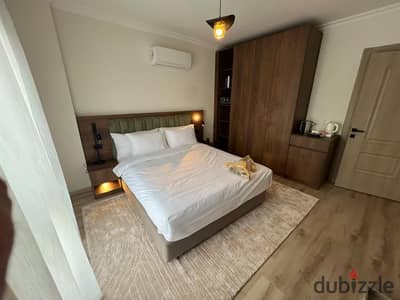 Finished apartment with ACs and kitchen at El Shorouk entrance, opposite Madinaty Gate 4 and Open Air Mall, in a 70-acre fully serviced compound.