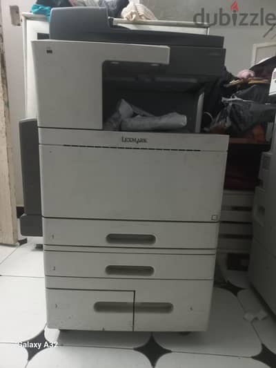ماكينه laxmark X925  تعمل بالكامل بكفاءة عاليه بها عطل سخان