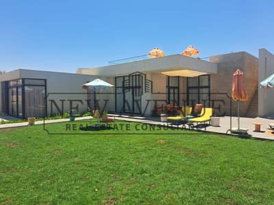 شاليه أرضي بجاردن خاصة للبيع في سوديك جون الساحل الشمالي Sodic June North Coast فى موقع متميز تشطيب كامل