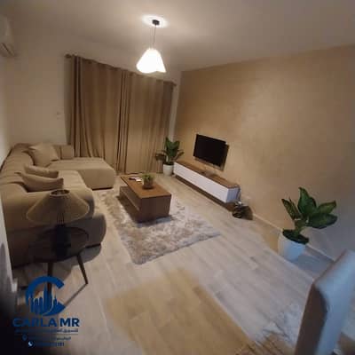 Furnished apartment for rent in Al Rehab, two bedrooms next to amenities