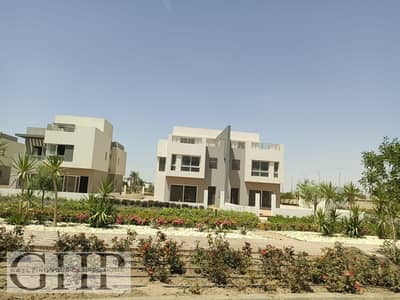 Overlooking the club house | Facing north Twin house For Sale Hyde park New Cairo