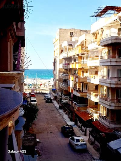 Apartment in Al-Ajami, Palm Beach, next to the sea and the main street, the sixth building from the sea directly, luxury finishing
