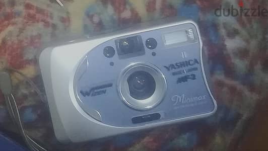 كاميرا تصوير فيلم قديمة من ماركة yashica طراز mf-2 (minimax / memo