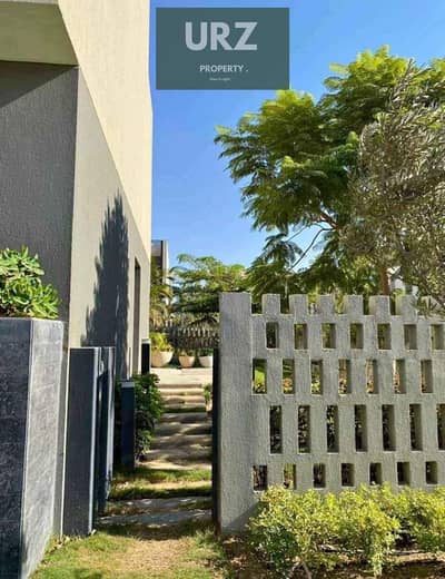 For sale at the best price in the market, a 5-room townhouse villa with a garden view, minutes from Open Air Madinaty, directly on the Suez Road