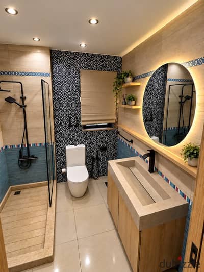 A unique ground floor apartment with a garden for sale in Madinaty, an amazing view, a great location, high finishing, and immediate delivery.