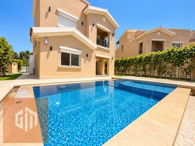 Semi-Furnished Standalone Villa for Rent in Mivida, New Cairo, First Use, 5 Bedrooms Including 2 Master Bedrooms, Swimming Pool, Central Heating