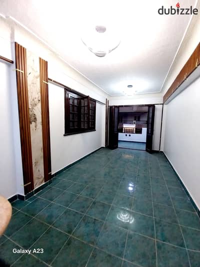 Apartment for sale in Al-Ajami, Al-Nakhil Beach, next to the main street, excellent residential location, inclusive of services
