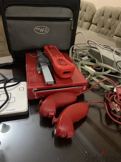 Nintendo Wii Console + Hard Drive with Games + Controllers