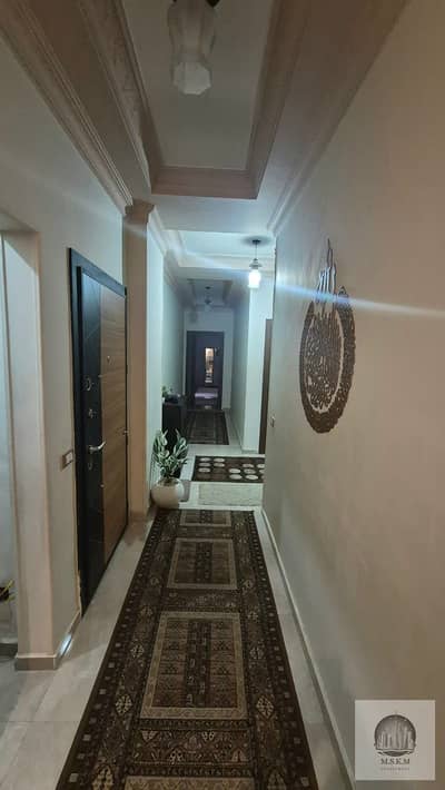 Apartment for sale, 215 sqm, in Al-Banafsaj Buildings – Fifth Settlement (New Cairo).
