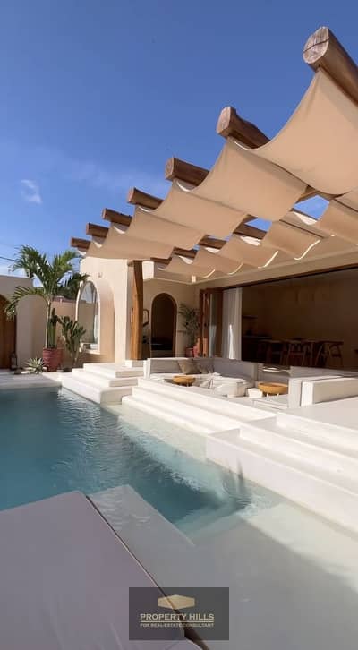 Chalet for rent with two rooms, fully finished, and next summer has a sea view and lagoons at The Med in the North Coast next to La Vista