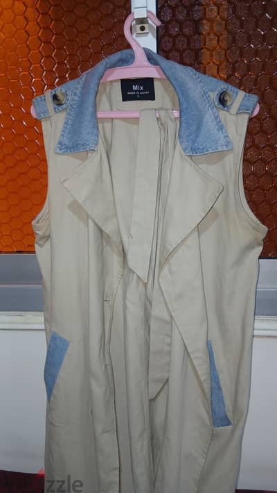 A gabardine coat worn only a few times