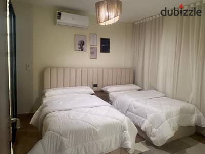 Furnished apartment for rent in Madinaty 107 square meters New hotel-style finishing and furnishings with the latest appliances, all brand new, air-conditioned, with Wi-Fi and network booster. Second floor, prime location on a street and in the B2