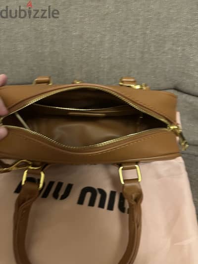 Miumiu like new