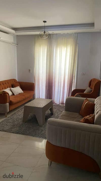 Opportunity! A furnished two-bedroom hotel-style apartment across from the malls, for rent in Madinaty.