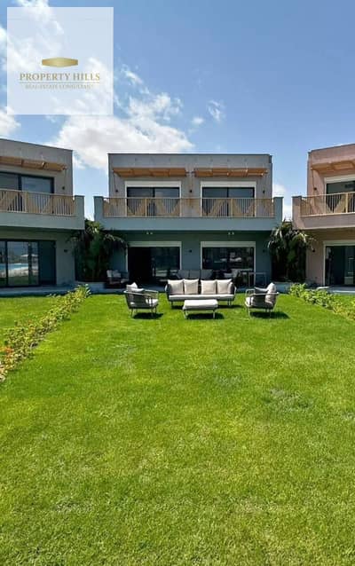 Ground-Floor Chalet with a Private Garden, Fully Finished to the Highest Quality Standards, First Row Directly on the Sea – Ready for Immediate Delive