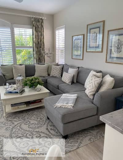 A distinctive apartment for sale with a sea view in a compound in Sheikh Zayed, next to Zed Towers.