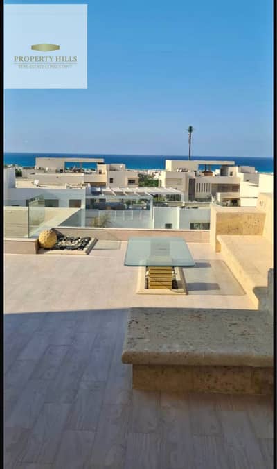 شاليه للبيع استلام فوري بفيو بحر وروف خاص فاخر في Hacienda White الساحل الشمالي