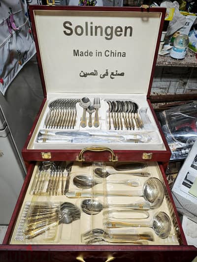 طقم ملاعق وسكاكين ستانلس ستيل بالكامل مع شنطة خشب فاخرة