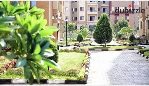 Ground floor with garden 80m+65m ultra super lux in Paradise Compound, October Gardens, 3 bedrooms and 2 bathrooms, 5 minutes from the Fayoum road and 10 minutes from the ring road at 2,500,000 EGP for contact.