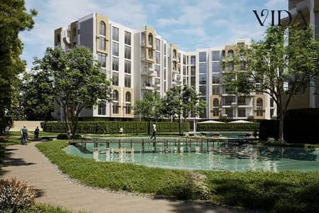 2-bedroom apartment (121 sqm) with an 84 sqm garden for sale in Bahjat Sheikh Zayed compound—located next to Royal City and Hyper One—with an 8-year