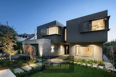Townhouse at an unbeatable price with an open view of the lagoon in Rock Eden compound, just minutes from the Wahat Road