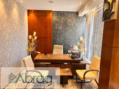 For rent, office 76m furnished with air conditioning in Shells Mall, the seventh district, Sheikh Zayed