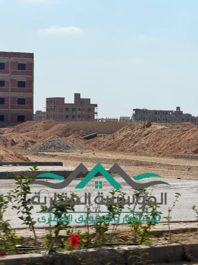 ارض 450م  تخصيص عمارة للبيع في اكتوبر الجديدة قرب طريق الواحات