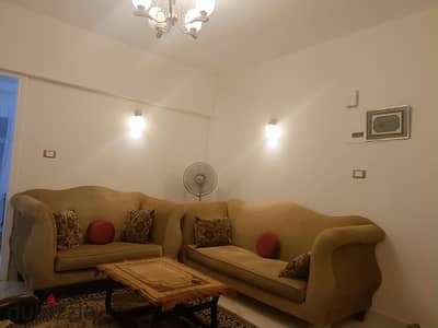 Furnished apartment for rent in Sheikh Zayed, District 11, second floor without elevator, two bedrooms, reception, kitchen, and bathroom, air-conditioned in both bedrooms, for rent with a minimum of 6 months