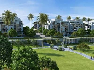 Townhouse for sale in Mountain View iCity October, 169 sqm, with an excellent view overlooking the axis (El-Mehwar); features
