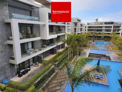 Apartment with a prime location overlooking the largest landscaped area for sale in Patio Riva compound, New Cairo