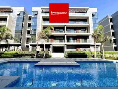 Apartment with a prime location overlooking the largest landscaped area for sale in Patio Riva compound, New Cairo