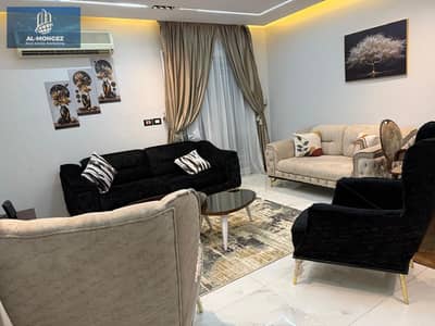 100-square-meter furnished apartment for rent in Al Rehab City, Phase 5—one of the most upscale phases in the city—located in the First Settlement are