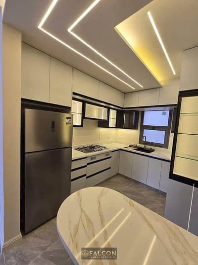 Fully finished apartment for sale with a down payment of 670,000 in AL JAR BRITISH compound in Shorouk City on the Suez Road,