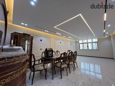 For sale in Al-Miraj, a seafront apartment with ultra-super luxury finishing, first occupancy by the sea