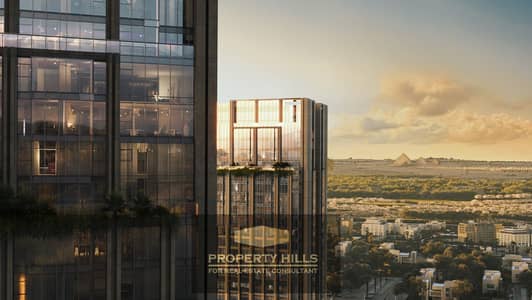 لقطة استثمارية في 205 من أركان بالم | شقة فندقية 115 متر بإدارة Crown Plaza وDirect على محور 26 يوليو
