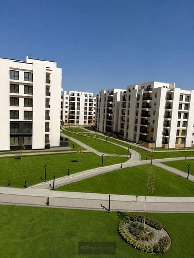 Apartment for sale in Bliss Gate compound, Sheikh Zayed, 100 sqm. Available with a down payment and flexible payment plans; located close to all ameni