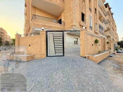 For sale, a villa of 215 meters with a corner facade, a high open view above the street, with a garage below.