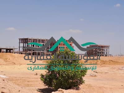 Land piece for sale in New October, Badya neighborhood, north of Al-Waha, third district, first adjacent area, distinguished housing.