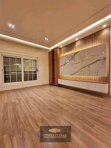 Apartment in the most distinguished location with a panoramic view of the Pyramids, ready for immediate delivery