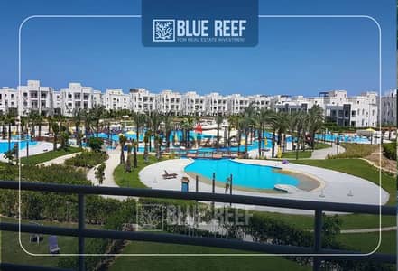 Chalet for sale in Amwaj compound; ground floor with a private garden, fully finished, furnished,air-conditioned,located directly in front of swimming