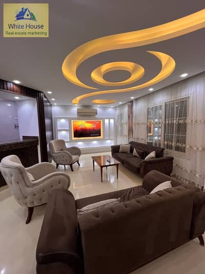 Apartment 136 m with a garden of 50 m, owned by Al-Rehab city, hotel finishing