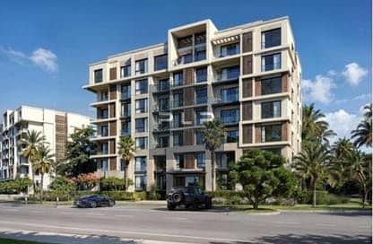Apartment with a garden for sale in City Gate compound. Features an open view, comes fully finished, and is available with flexible payment plans in a