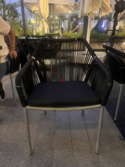 Outdoor cafe black chairs
