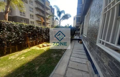 Ground-floor apartment with a garden for rent in Madinaty; features 2 bedrooms, 2 bathrooms, and an area of ​​118 sqm; located in front of the ameniti
